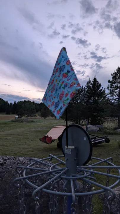 The fish flag over a basket at dusk