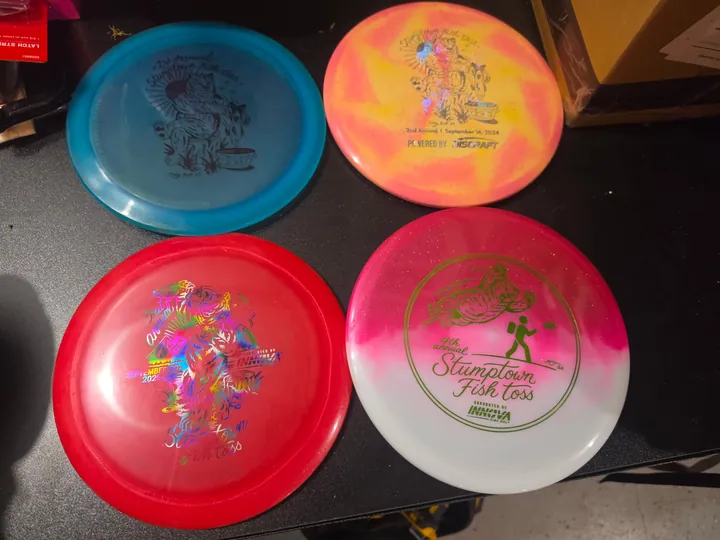 Four of this year’s Fish Toss discs