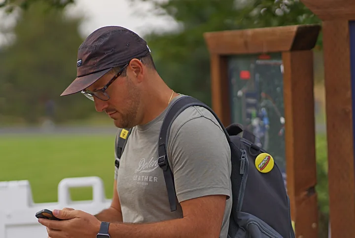 A player checking his phone